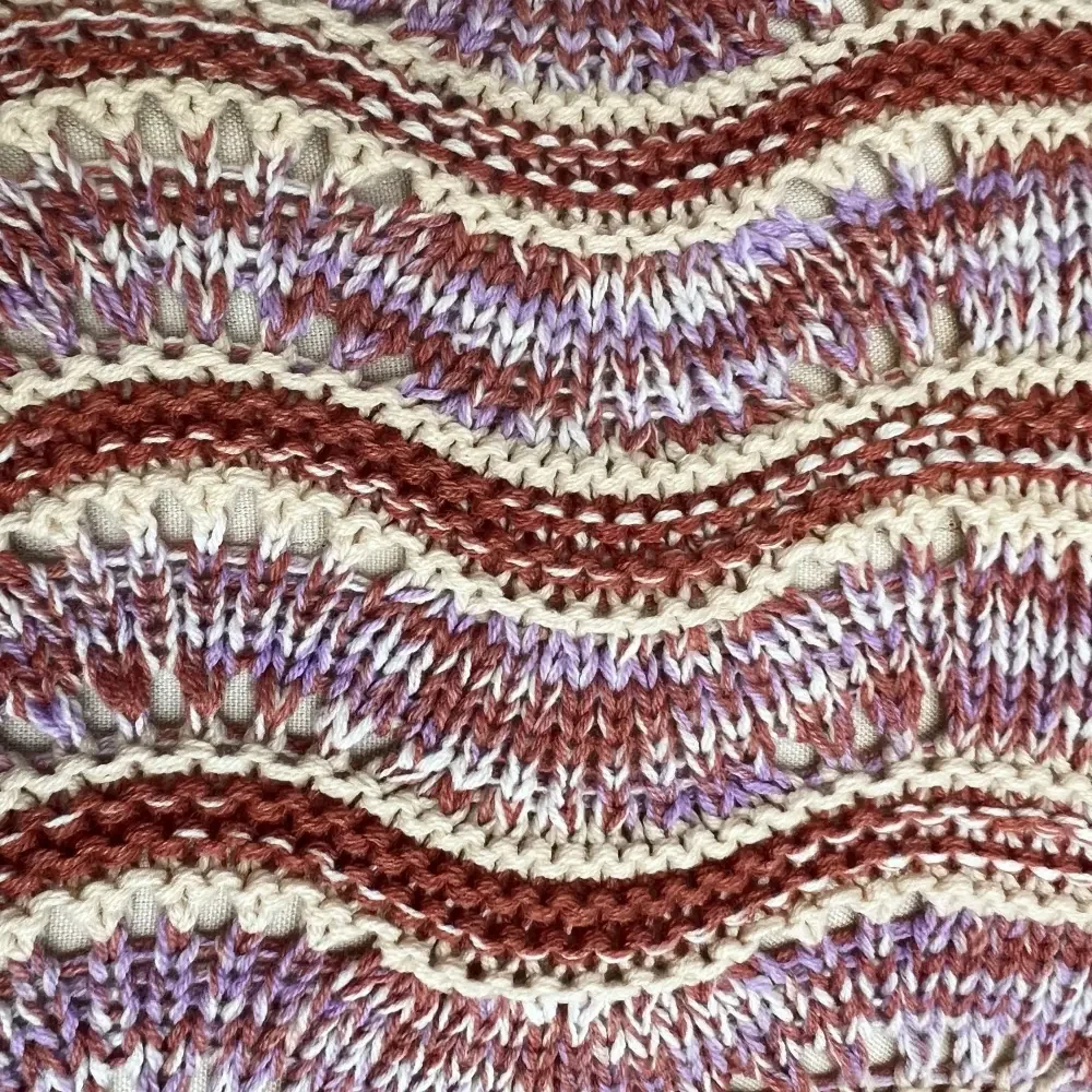 Abstract wave knit pattern detail