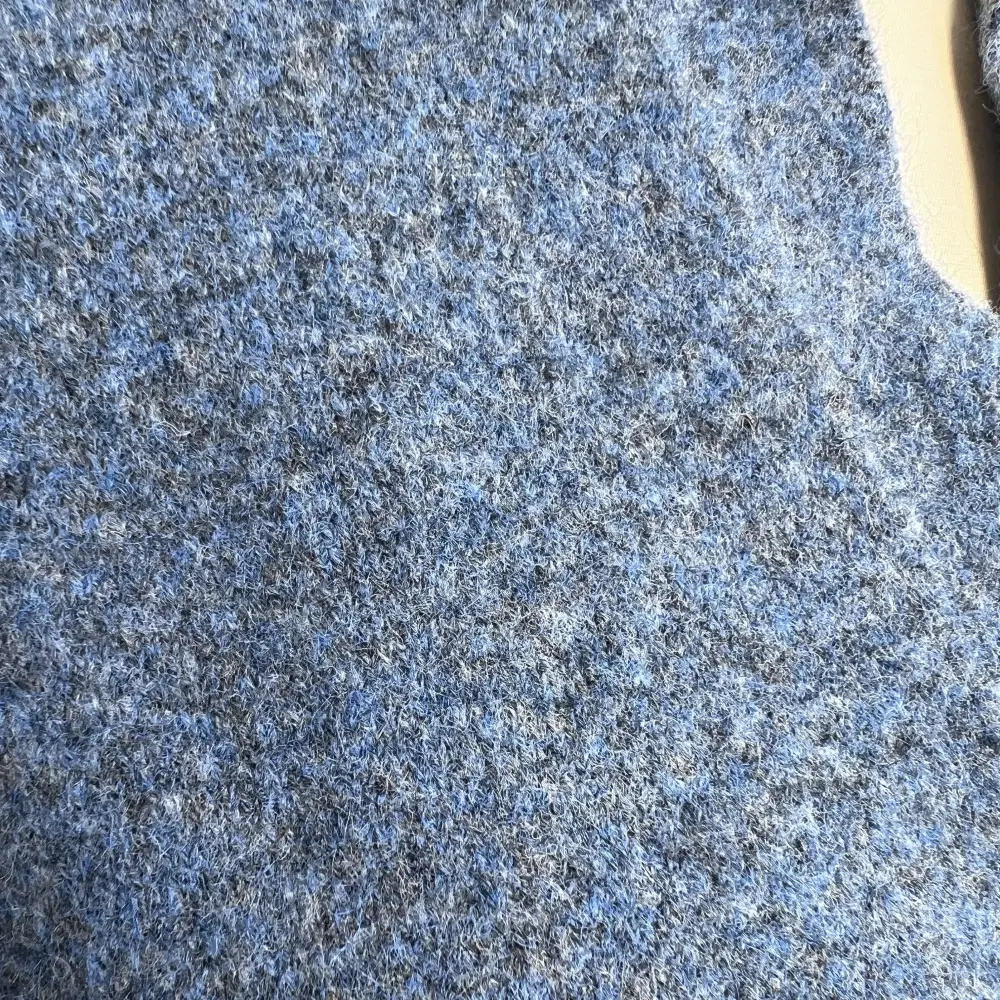 Blue melange knit close-up detail