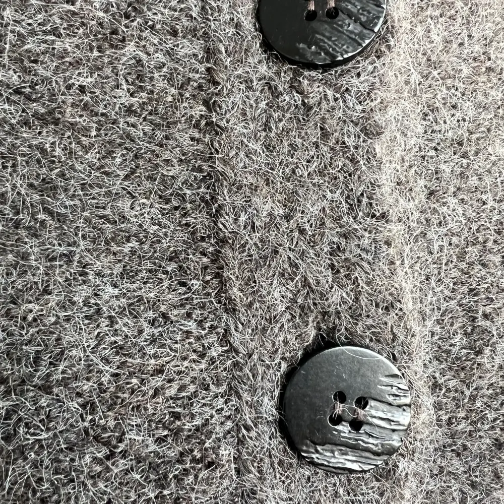 Grey button knit cardigan detail
