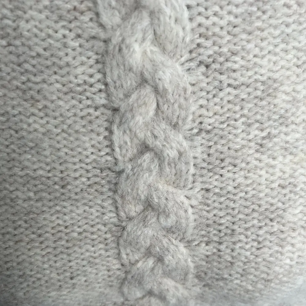 Handcrafted braided knit detail