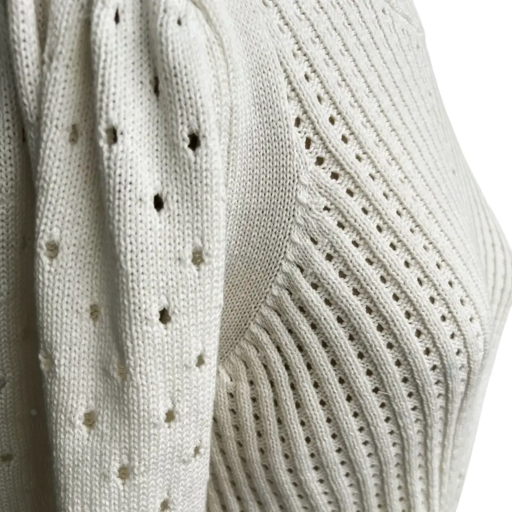 Pearl knit sweater detail