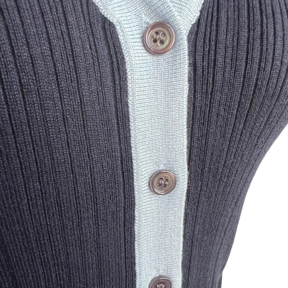 Purple button knit cardigan detail