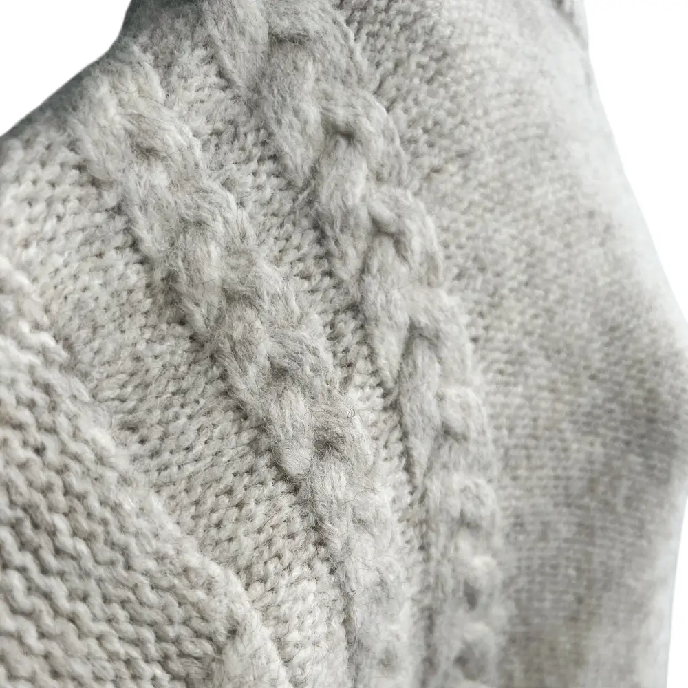 Soft cable knit seam detail
