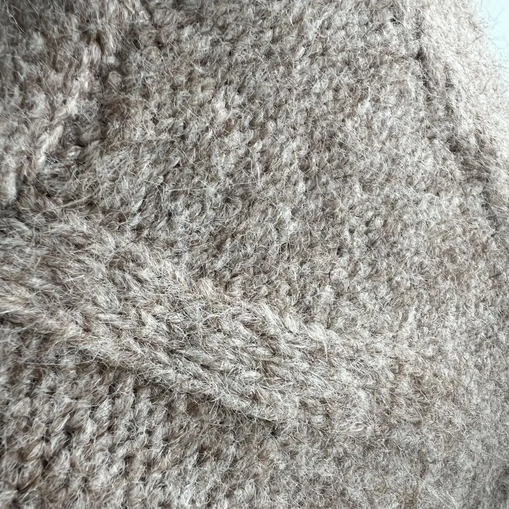 Soft melange knit texture detail