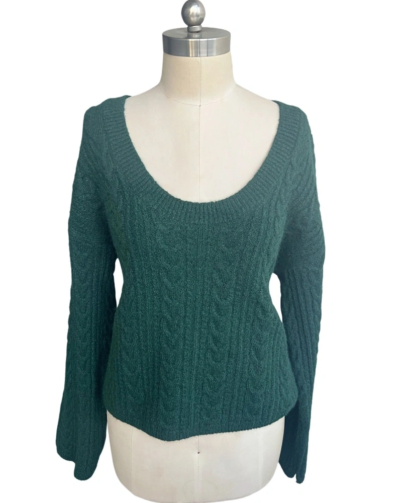 Women's green V-neck knit sweater